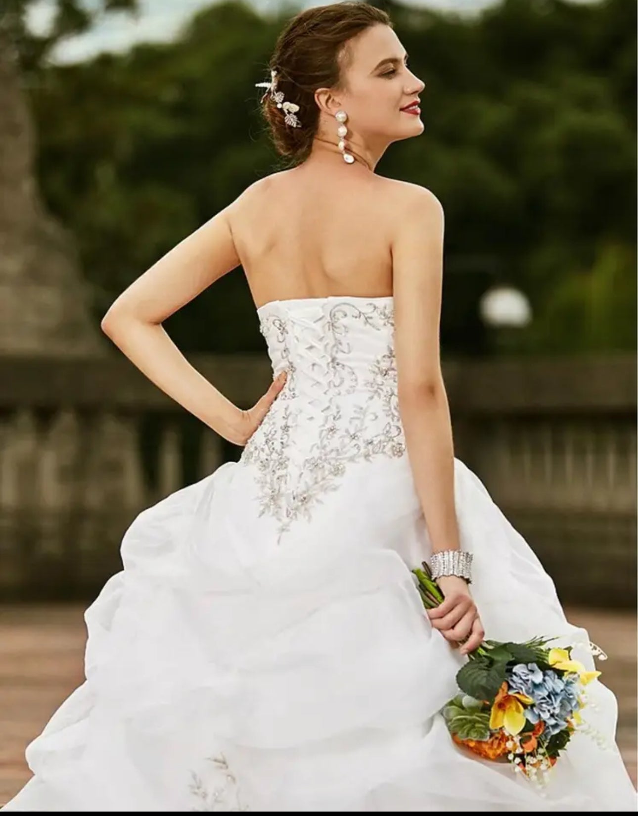 Elevate Your Wedding Look with Our Stunning Lace-Up Back Strapless Rhinestone Beaded Organza Wedding Gown