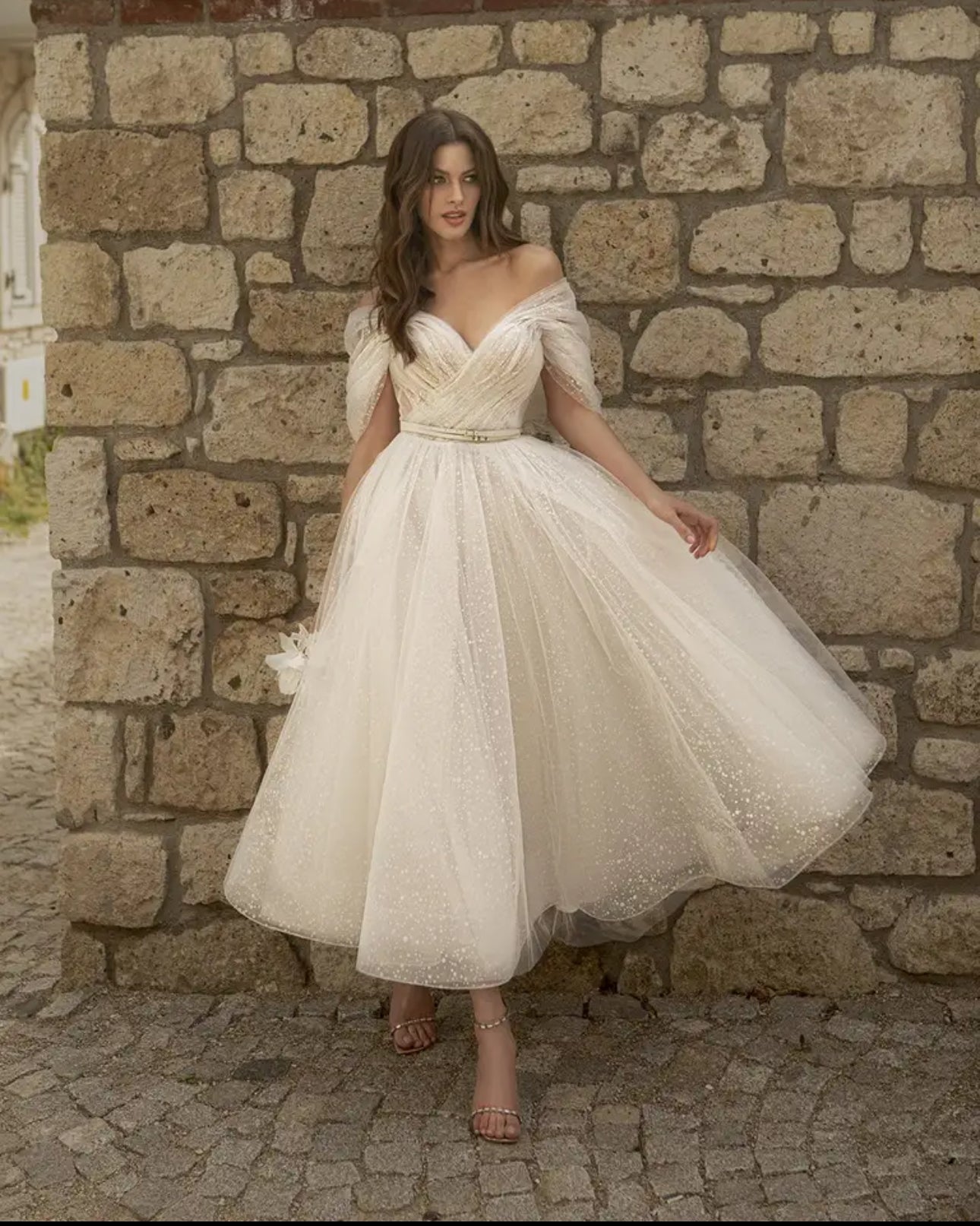 Sparkle on Your Big Day with our Tea Length Glittered Tulle Wedding Dress