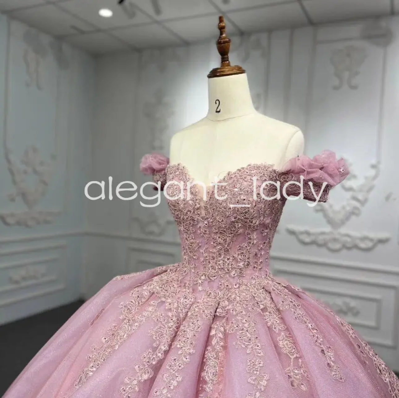 Get Ready to Turn Heads in our Off the Shoulder Lace Applique Quinceanera/Sweet 16 Ball Gown!