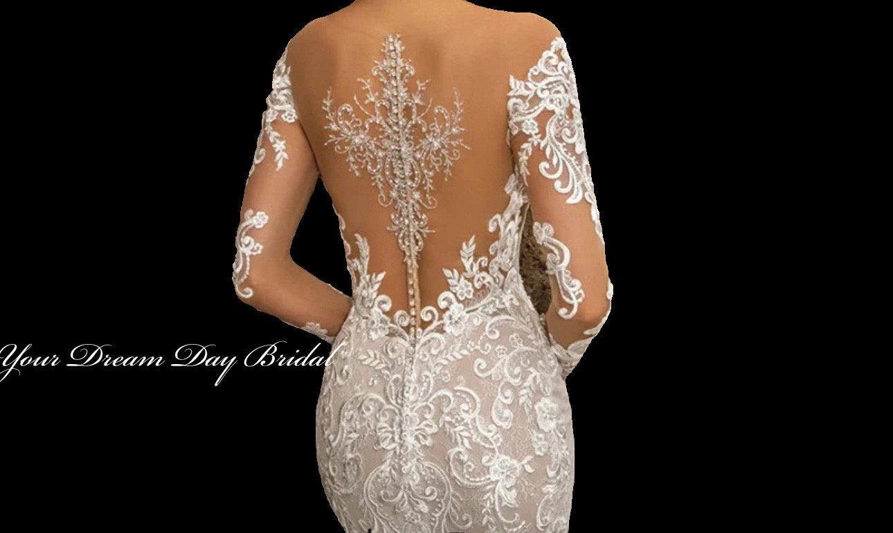 Elegant Long Sleeve Deep - V Beaded Mermaid Wedding Gown with Lace Appliques and Royal/Cathedral Train - Your Dream Day Bridal